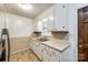Functional kitchen with white cabinets, classic countertops, and tiled flooring at 3491 Mcconnells Hwy, Rock Hill, SC 29732