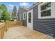 Back deck made of wood, attached to a home with gray siding at 410 E 17Th St, Kannapolis, NC 28083