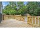 Wooden back deck with a view of the backyard and shed at 410 E 17Th St, Kannapolis, NC 28083