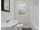 Bright bathroom featuring a vanity, and a shower/tub combo at 410 E 17Th St, Kannapolis, NC 28083