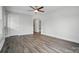 Bright living room with sleek floors, white walls and trim at 410 E 17Th St, Kannapolis, NC 28083