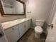 Functional bathroom with vanity, mirror, toilet, and shower/tub combination at 5008 Delivau Dr, Charlotte, NC 28215