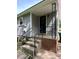 This entrance features brick steps and black metal railings at 5008 Delivau Dr, Charlotte, NC 28215