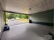 Spacious carport offers covered parking at 501 N Hawthorne St, Mount Holly, NC 28120