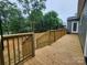 Spacious wooden deck area that offers plenty of room for outdoor seating and entertaining at 501 N Hawthorne St, Mount Holly, NC 28120