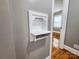 A charming built-in niche adds character to the hallway, offering a unique display space at 501 N Hawthorne St, Mount Holly, NC 28120