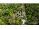 Expansive aerial view of the property showcasing lush green surroundings at 6758 Zion Church Rd, Concord, NC 28025
