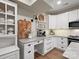 Bright kitchen nook featuring white cabinets, granite countertops, and an espresso machine at 6758 Zion Church Rd, Concord, NC 28025