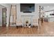 Inviting living space with fireplace, decorative accents, and hardwood floors at 6758 Zion Church Rd, Concord, NC 28025