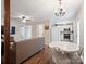 Open-concept living space with a living room, dining area, and kitchen promoting seamless interaction at 6758 Zion Church Rd, Concord, NC 28025