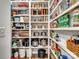 Well-organized walk-in pantry with ample shelving for food storage and kitchen essentials at 6758 Zion Church Rd, Concord, NC 28025