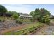 Scenic yard leading to the house with stunning landscaping at 7471 Barfield Ln, Denver, NC 28037