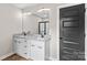 Modern bathroom with granite countertops, dual sinks, vanity, and view of the shower at 750 Whites Farm Rd, Statesville, NC 28625
