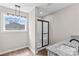 Bright bathroom with a new shower, stylish vanity with granite countertop, and wood-look flooring at 750 Whites Farm Rd, Statesville, NC 28625