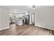 Open-concept kitchen and living space with island, stainless steel appliances, and modern finishes at 750 Whites Farm Rd, Statesville, NC 28625