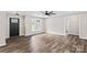 Spacious living room with modern flooring, neutral paint, and ample natural light at 750 Whites Farm Rd, Statesville, NC 28625