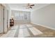 Bright, airy bedroom with hardwood floors and large windows with views at 8200 Sunset Hill Rd, Waxhaw, NC 28173