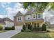 Beautiful two-story home with well-maintained landscaping at 8200 Sunset Hill Rd, Waxhaw, NC 28173