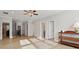 Hallway upstairs with natural light and hardwood floors. Includes view of stairs at 8200 Sunset Hill Rd, Waxhaw, NC 28173