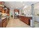 Spacious kitchen features stainless steel appliances, ample wood cabinetry, granite countertops, and an open layout perfect for entertaining at 8200 Sunset Hill Rd, Waxhaw, NC 28173