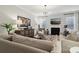 Comfortable living room with a fireplace and stylish furniture at 8200 Sunset Hill Rd, Waxhaw, NC 28173