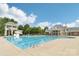 Large community pool with slide and sunbathing deck area at 8200 Sunset Hill Rd, Waxhaw, NC 28173