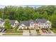 Aerial view of charming homes with well-maintained landscaping and ample parking at 8313 Carob Tree Ln, Charlotte, NC 28215