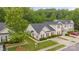 Aerial view of charming homes with well-maintained landscaping and ample parking at 8313 Carob Tree Ln, Charlotte, NC 28215