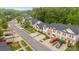 Aerial view of charming homes with well-maintained landscaping and ample parking at 8313 Carob Tree Ln, Charlotte, NC 28215