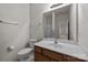 Bathroom featuring a well-lit mirror and shower at 8313 Carob Tree Ln, Charlotte, NC 28215