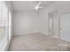 Neutral bedroom with natural light and an ensuite bathroom at 8313 Carob Tree Ln, Charlotte, NC 28215
