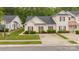 Charming single-story home with cream siding, red shutters and well-maintained landscaping at 8313 Carob Tree Ln, Charlotte, NC 28215