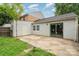Backyard with concrete pad, fence, and siding on building at 8325 Knights Bridge Rd, Charlotte, NC 28210