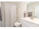 Well-lit bathroom with a shower-tub combination, white vanity, and modern fixtures at 8509 Sienna Dr, Charlotte, NC 28215