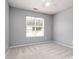 Bedroom featuring carpet and a window at 8509 Sienna Dr, Charlotte, NC 28215