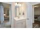 Bathroom features a white vanity and a door, which leads to the bedroom on the left at 876 Hardin St # B24, Lancaster, SC 29720