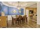 Elegant dining room boasts modern decor, wainscoting, and comfortable seating at 876 Hardin St # B24, Lancaster, SC 29720