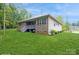 A charming brick home with a well-manicured lawn and lovely landscaping offers curb appeal and a welcoming atmosphere at 876 Hardin St # B24, Lancaster, SC 29720