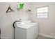 Bright laundry room with window and white washer and dryer at 876 Hardin St # B24, Lancaster, SC 29720