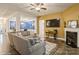 Open concept living space featuring a fireplace, modern decor, and seamless flow at 876 Hardin St # B24, Lancaster, SC 29720