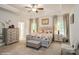 Main bedroom suite with tray ceiling, neutral tones, two windows for natural light at 876 Hardin St # B24, Lancaster, SC 29720