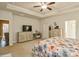 Bright bedroom with tray ceiling, dresser, and open concept design at 876 Hardin St # B24, Lancaster, SC 29720