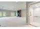 Finished basement with stone fireplace, walkout doors, and residential elevator at 89 Wexford Pt, Hickory, NC 28601