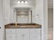 Bathroom featuring a granite vanity and a large mirror at 89 Wexford Pt, Hickory, NC 28601