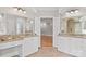 Primary bathroom with dual vanities, glass shower, and access to the main bedroom at 89 Wexford Pt, Hickory, NC 28601