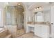 Bathroom boasts glass enclosed shower, soaking tub, granite counters, and dual vanities at 89 Wexford Pt, Hickory, NC 28601