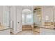 A relaxing bathroom features a soaking tub, glass shower, and dual vanities at 89 Wexford Pt, Hickory, NC 28601