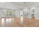 Large bedroom with tray ceiling, recessed lighting, and hardwood flooring at 89 Wexford Pt, Hickory, NC 28601