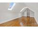 Bonus room featuring hardwood floors and skylights for ample natural light at 89 Wexford Pt, Hickory, NC 28601