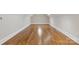Spacious bonus room with hardwood floors and a unique round window at 89 Wexford Pt, Hickory, NC 28601